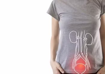 Grafika przedstawia kobietę, która ma problem z układem moczowym.