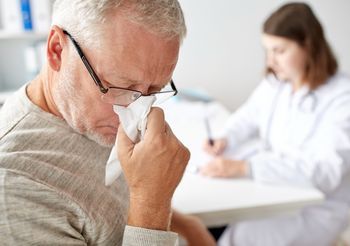 Zielony katar u dorosłego.